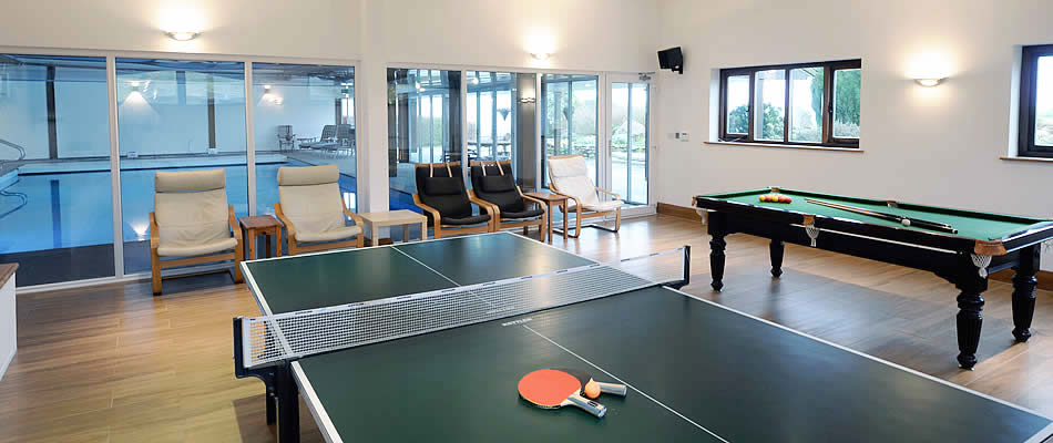 Well equipped games room accessed from the swimming pool